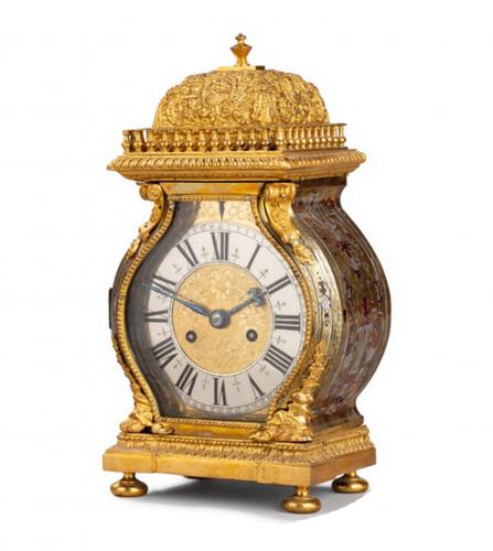 A Louis XIV brass and pewter travelling clock